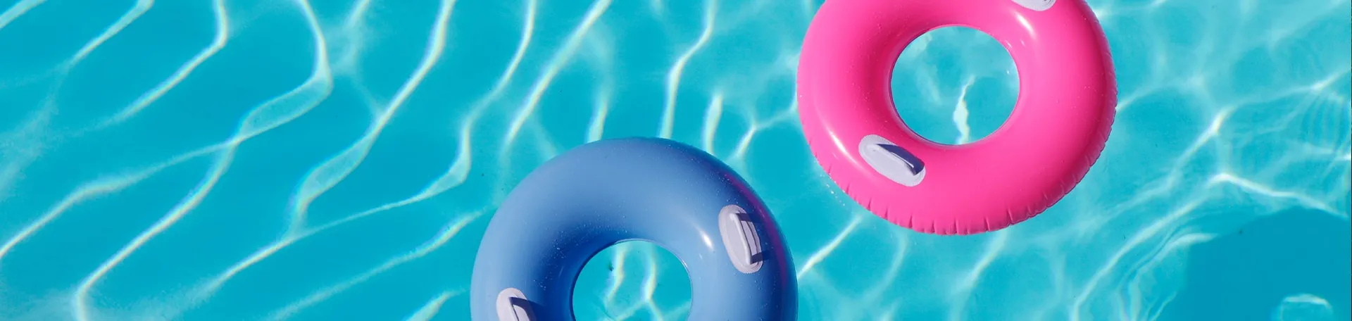 Inflatable rings floating in a swimming pool