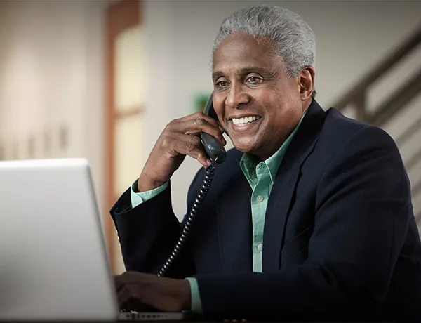 A financial professional speaking with a client